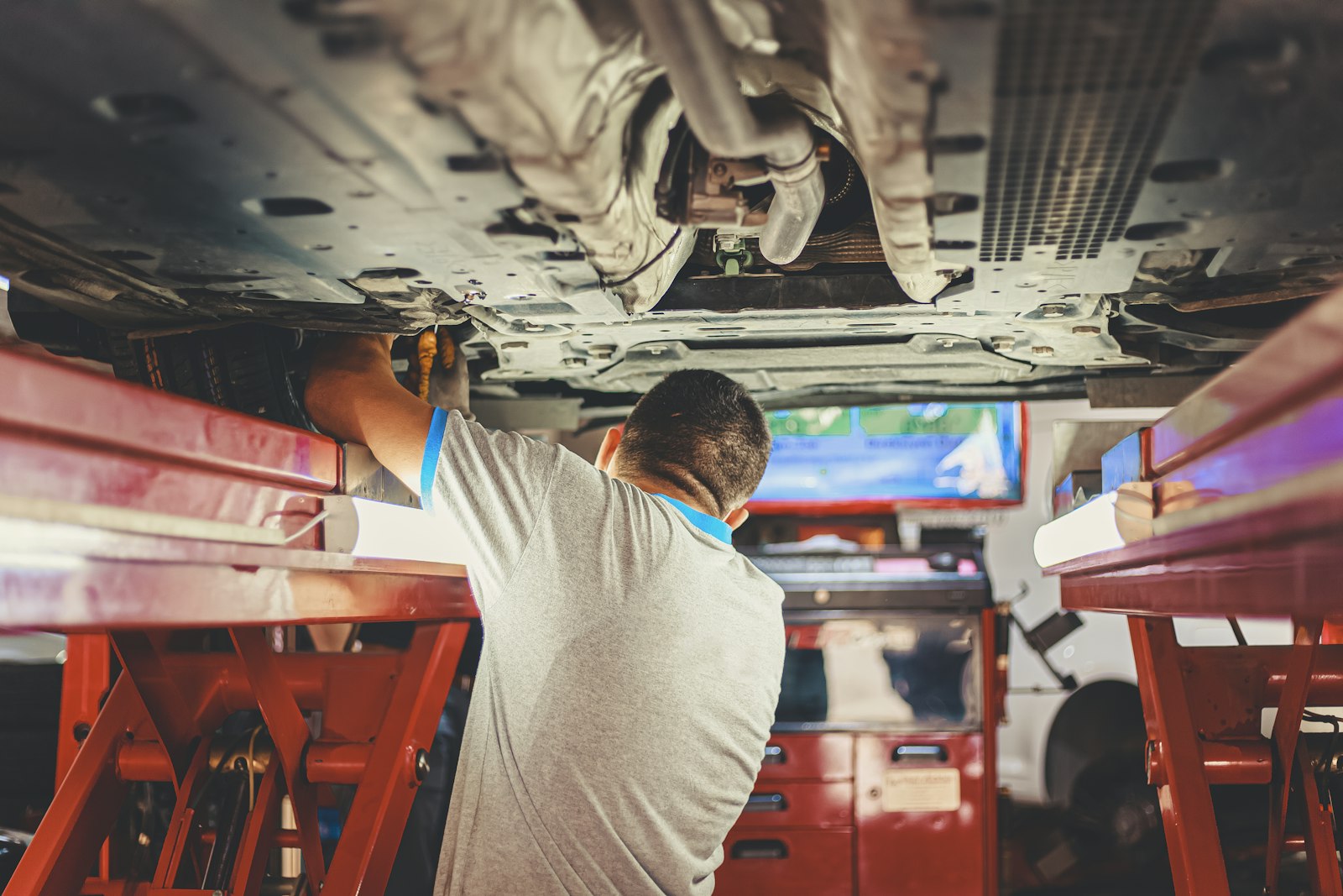 Mechanic in a workshop waiting area