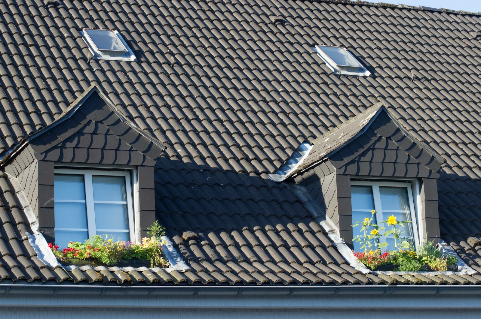 Close-up of brown roof tiles on a finished roof